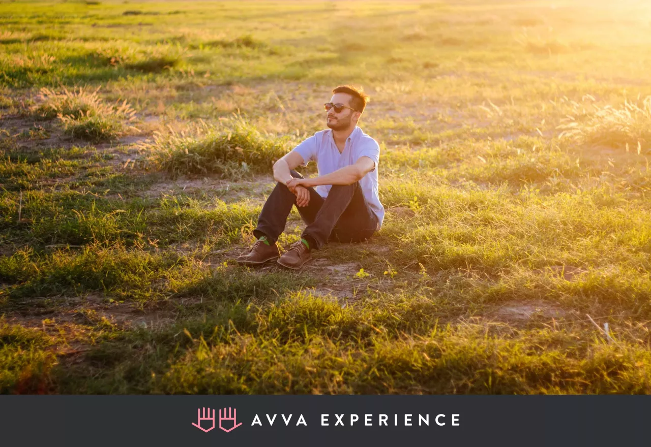 Person resting outdoors surrounded by nature
