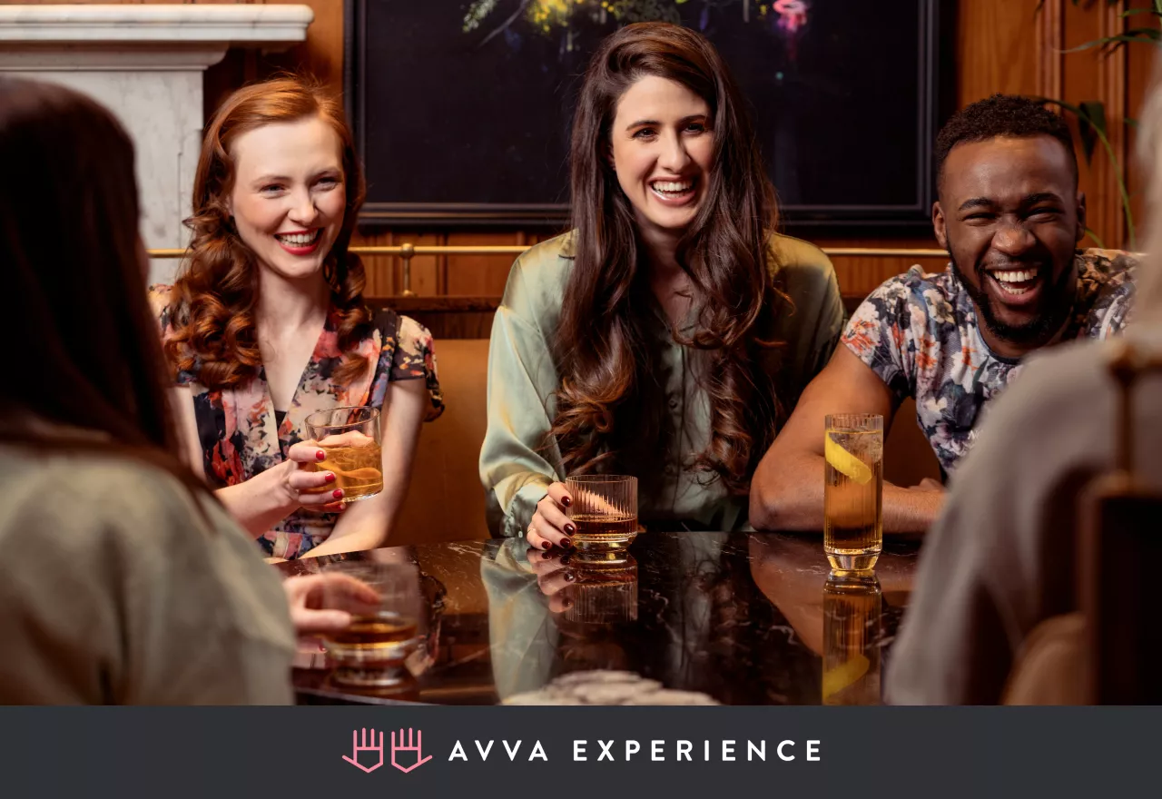  People tasting and enjoying whiskey together during a virtual whiskey tasting event