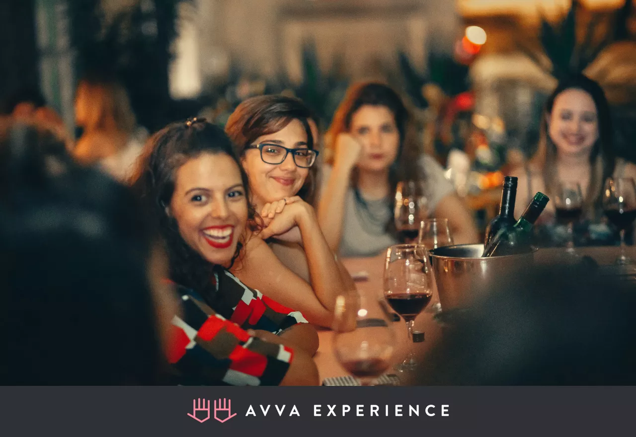 Happy people enjoying cocktails at a client appreciation event