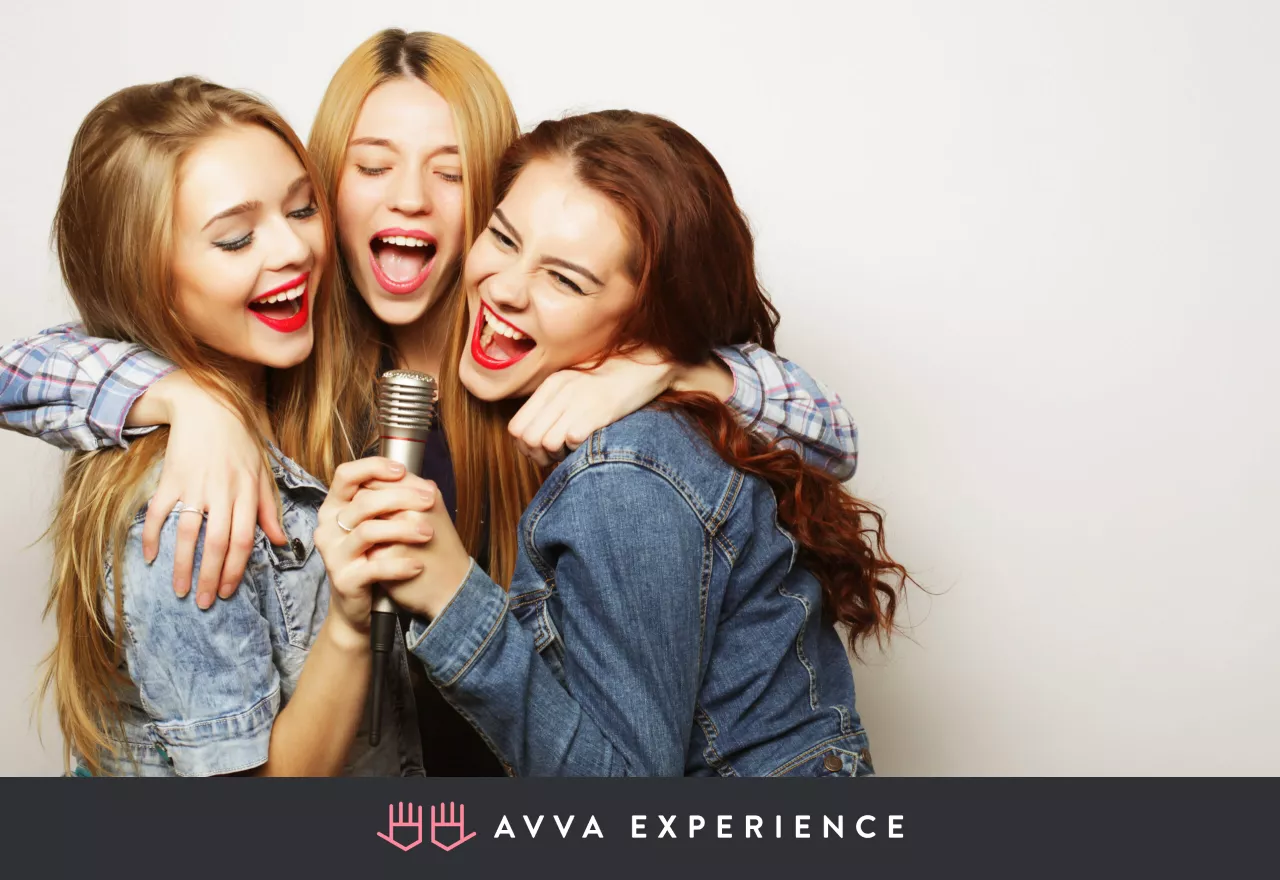 Happy women singing together on Women’s Equality Day
